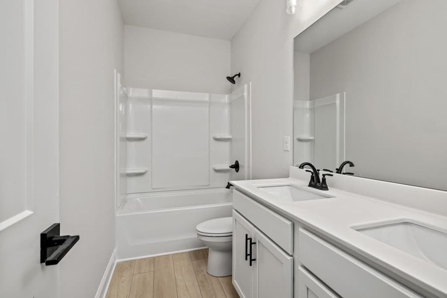 Representative furnished interior of a home built from the The Baldwin by UnionMain Homes in Austin Springs, Bethlehem (Image 10).
