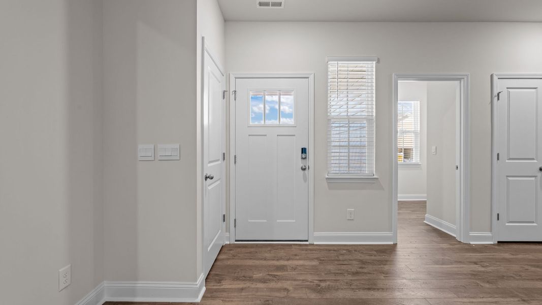 Spacious, unfurnished interior of a new home in Tyler - Home on the Lake, New Bern (Image 13).