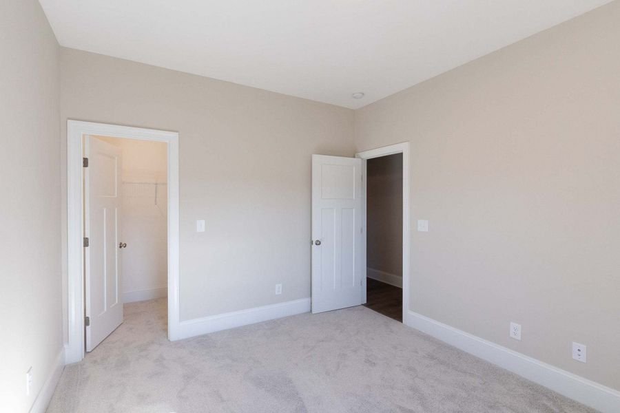 Representative unfurnished interior of a home built from the Carver by Caviness & Cates Communities in Maggie Way, Wendell (Image 142).