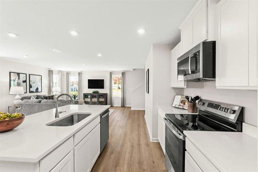 Representative furnished interior of a home built from the Woodford by Ryan Homes in Oakwood Trace, Fairburn (Image 9).