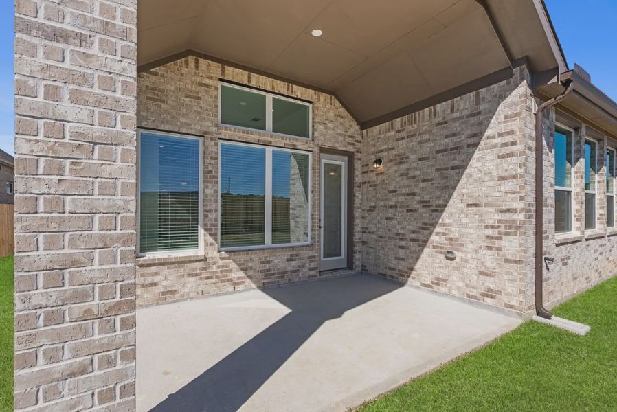 Exterior details and patio area of a home in Wood Leaf Reserve, Tomball (Image 2). Exterior details and patio area of a home in Wood Leaf Reserve, Tomball (Image 2).