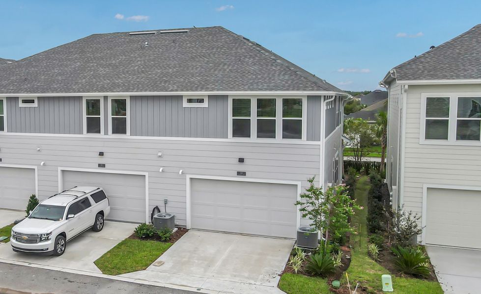 Representative exterior photo of a completed home built from the Bartram - B - Townhome Series by ICI Homes in West End at Town Center, Ponte Vedra, FL (Image 18). Representative exterior photo of a completed home built from the Bartram - B - Townhome Series by ICI Homes in West End at Town Center, Ponte Vedra, FL (Image 18).