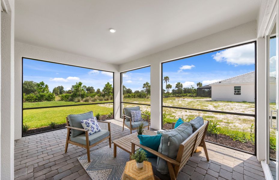 Exterior details and patio area of a home in TerraWalk at Babcock Ranch, Alva (Image 24). Exterior details and patio area of a home in TerraWalk at Babcock Ranch, Alva (Image 24).