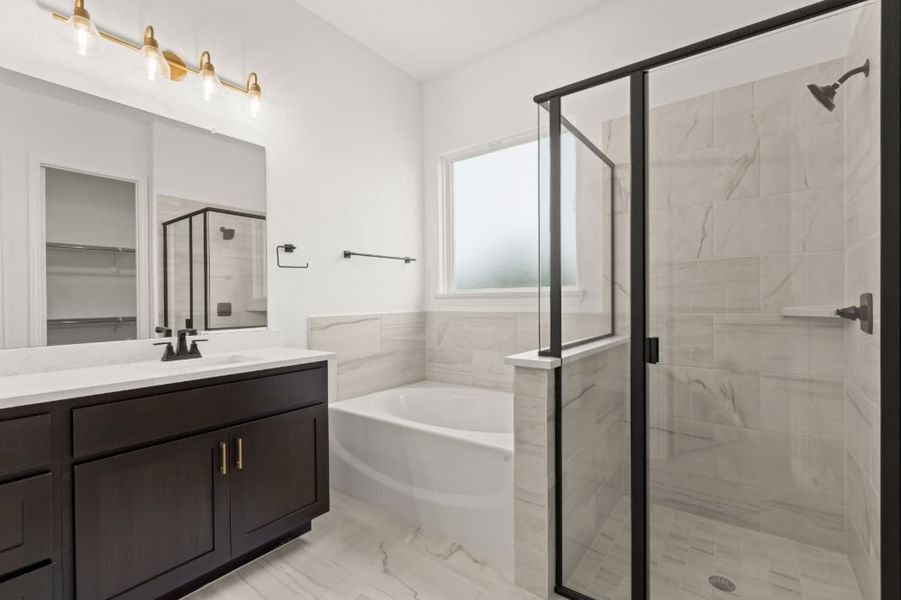 Representative furnished interior of a home built from the The Whitney by UnionMain Homes in Cambridge Crossing, Celina (Image 16).