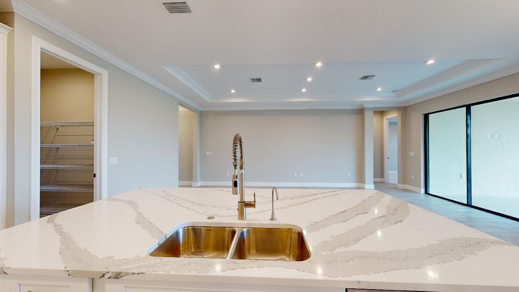 Representative furnished interior of a home built from the Azzurro by Taylor Morrison in Esplanade by the Islands, Naples (Image 3).