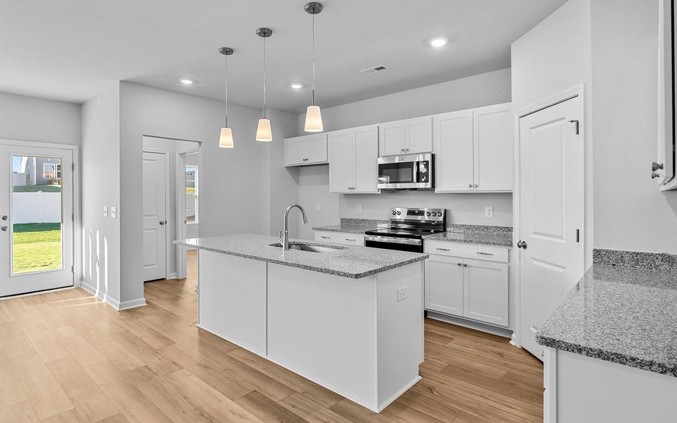 Furnished interior view inside a new home in Fieldstone, Lexington (Image 9).