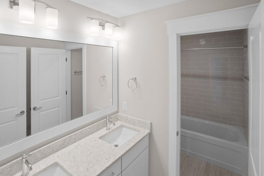 Furnished interior view inside a new home in Osprey Landing, Southport (Image 17).