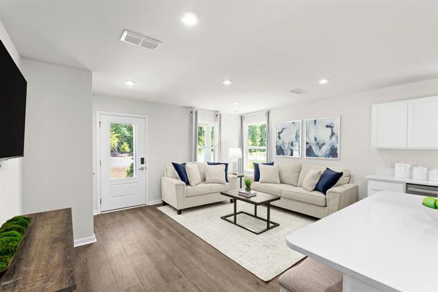 Representative furnished interior of a home built from the Ellis by Ryan Homes in Middle Creek Village Coastal Cottages & Villas, Bolivia (Image 13).