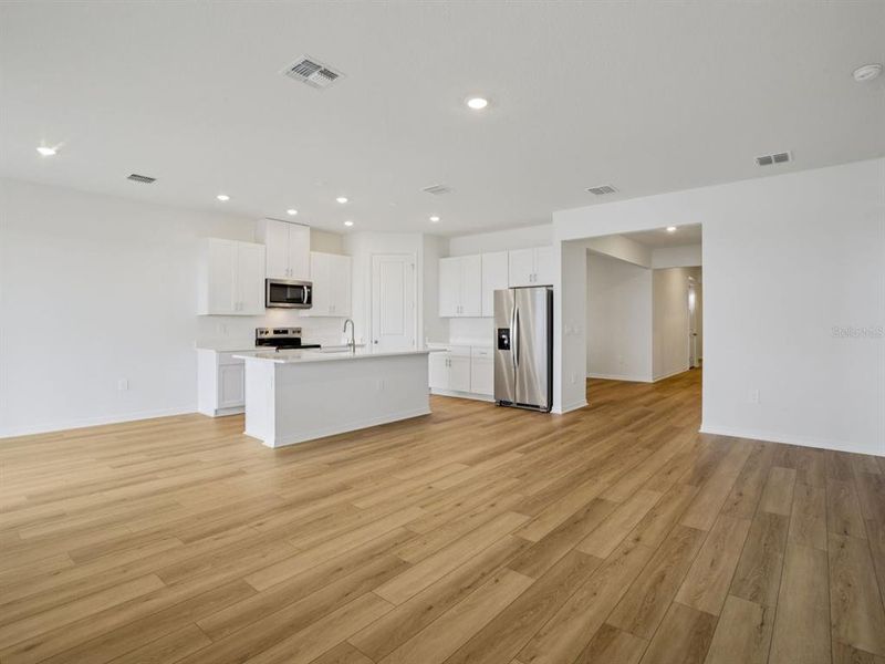 Spacious, unfurnished interior of a new home in Coasterra - Reserve Series, Palmetto (Image 11).