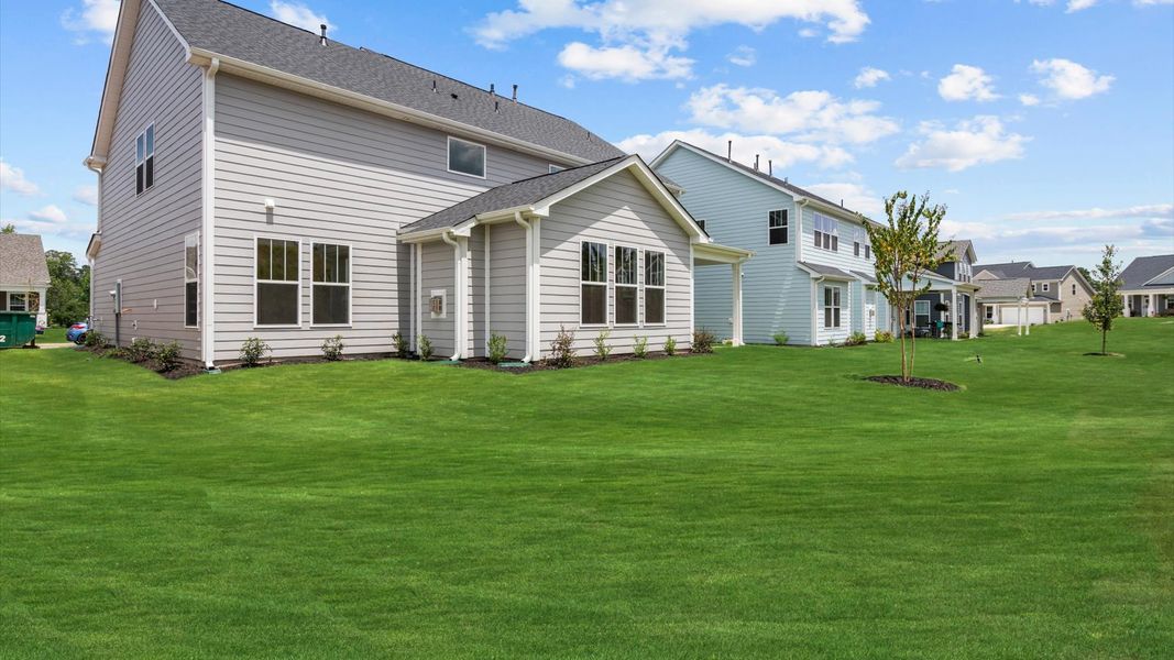 Front exterior of a new home in Wells Crossing, Seneca, SC, highlighting curb appeal (Image 21).