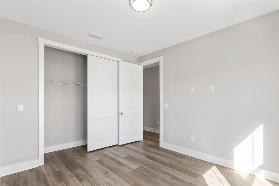 Representative unfurnished interior of a home built from the Pearl by Brock Built in Nautilus Pointe, Inlet Beach (Image 32).