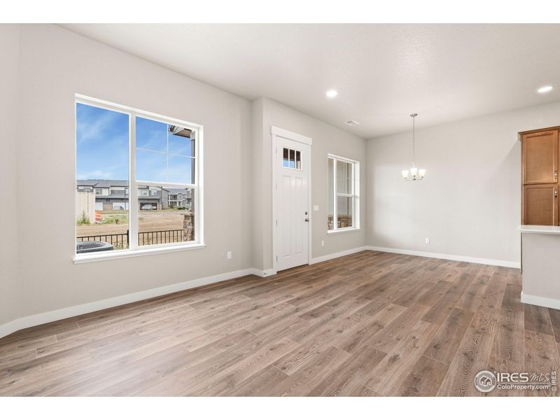Spacious, unfurnished interior of a new home in The Lakes at Centerra - Discovery, Loveland (Image 11).