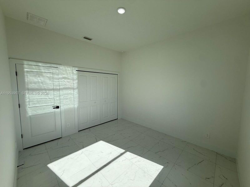 Spacious, unfurnished interior of a new home in , Lehigh Acres (Image 22). Spacious, unfurnished interior of a new home in , Lehigh Acres (Image 22).