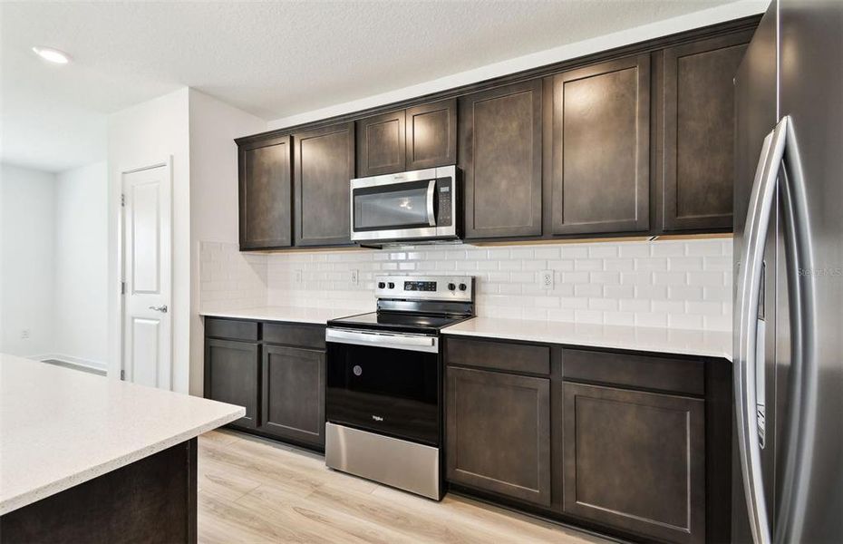 Furnished interior view inside a new home in Oakfield Lakes, Parrish (Image 5).
