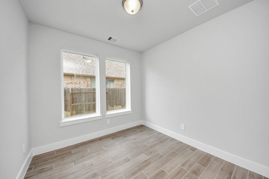 Spacious, unfurnished interior of a new home in Amira: Premier Collection, Tomball (Image 22).