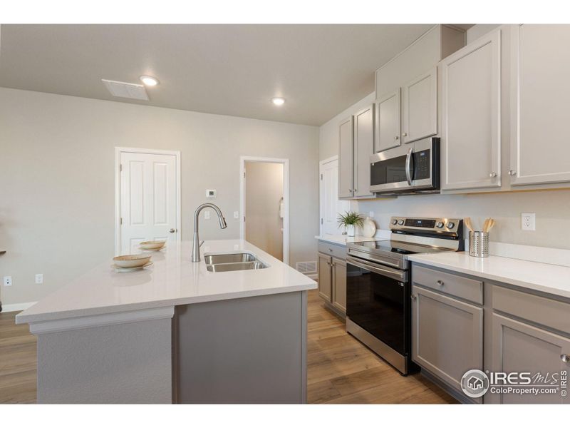 Furnished interior view inside a new home in Spring Valley, Longmont (Image 24). Furnished interior view inside a new home in Spring Valley, Longmont (Image 24).