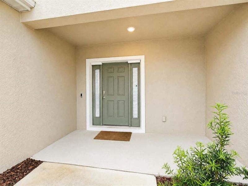 Exterior details and patio area of a home in Rivers Edge, Edgewater (Image 26).