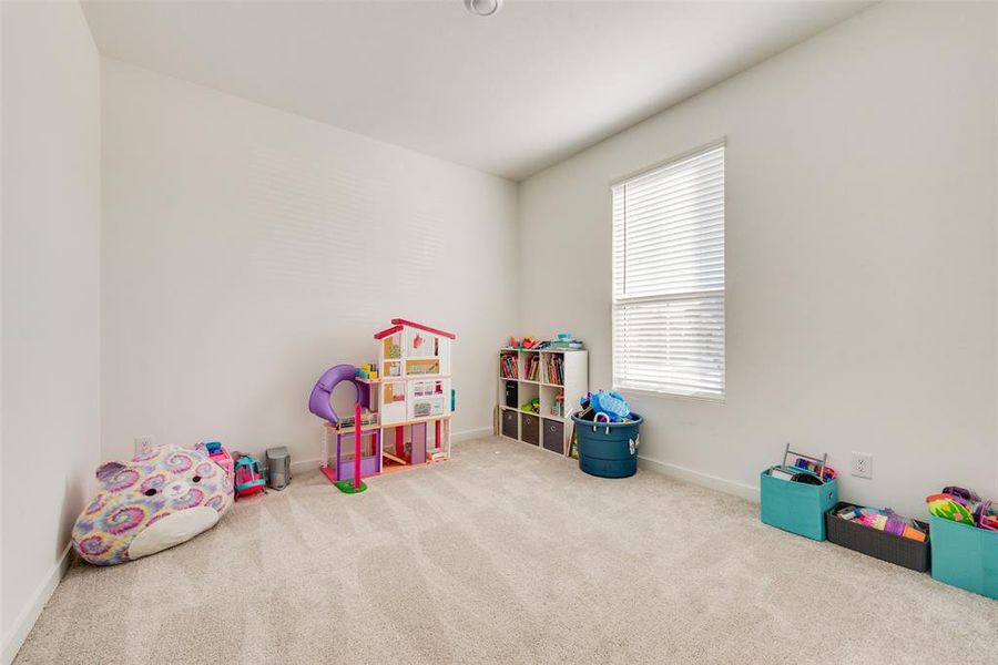 Spacious Front Bedroom or kids play room
