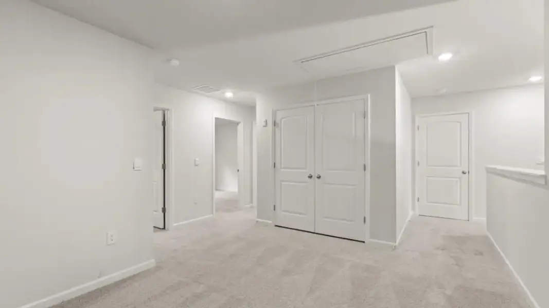 Spacious, unfurnished interior of a new home in Waypoint, Flowery Branch (Image 22).