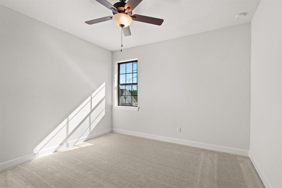 Upstiars spacious bedroom #3, includes ceiling fan