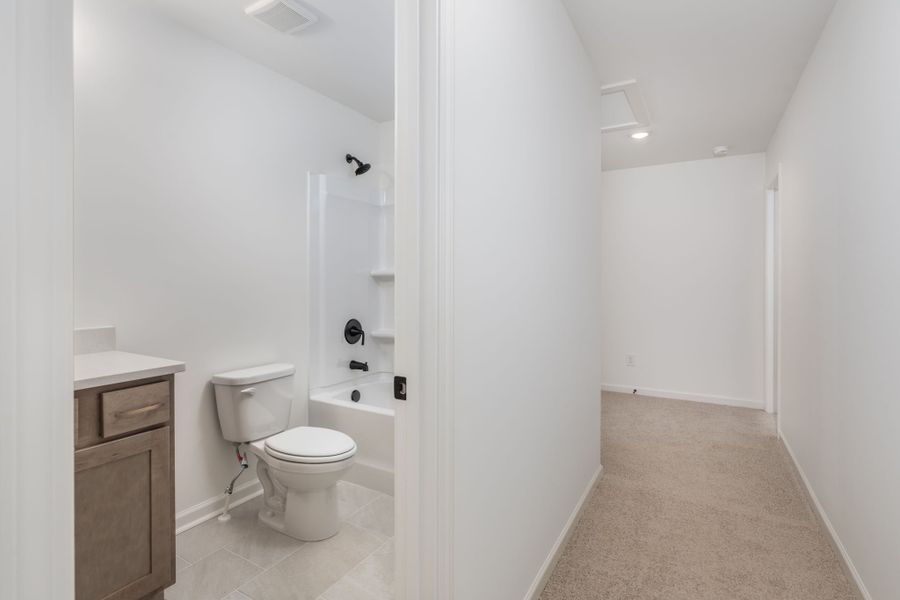 Furnished interior view inside a new home in Stewart Estates, Meansville (Image 18).