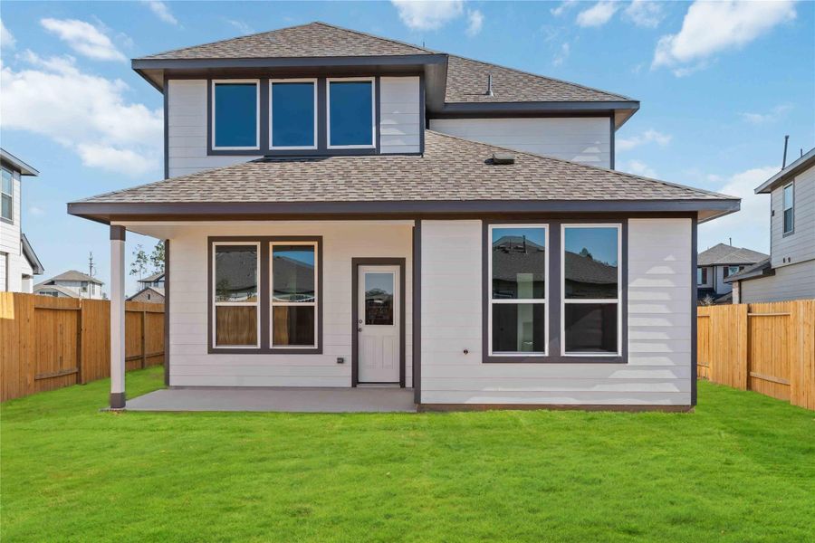 Exterior details and patio area of a home in Granger Pines, Conroe (Image 3).