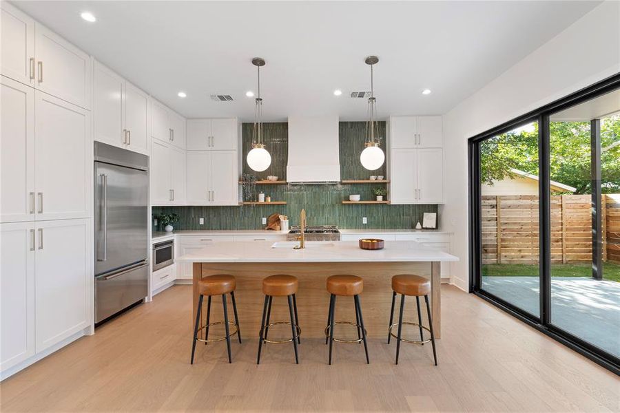 Light permeates this space with large sliding glass door