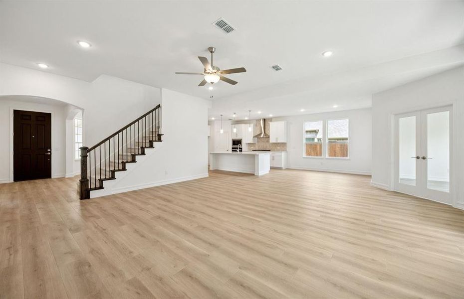 Open concept throughout main living areas *real home pictured Open concept throughout main living areas *real home pictured