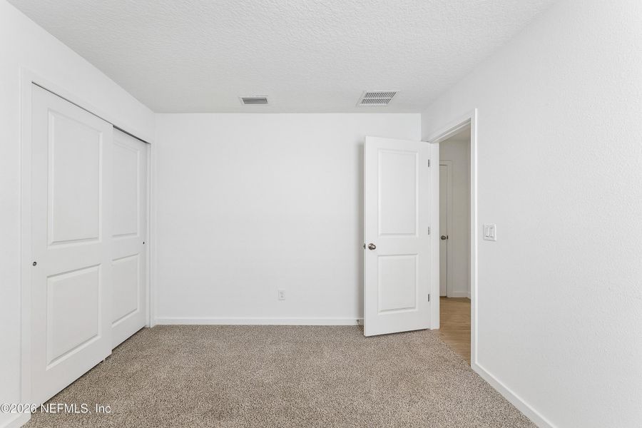 Spacious, unfurnished interior of a new home in Lakes at Bella Lago – Classic Series, Green Cove Springs (Image 32).