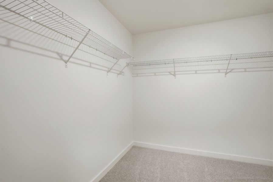 Primary Walk-In Closet Primary Walk-In Closet