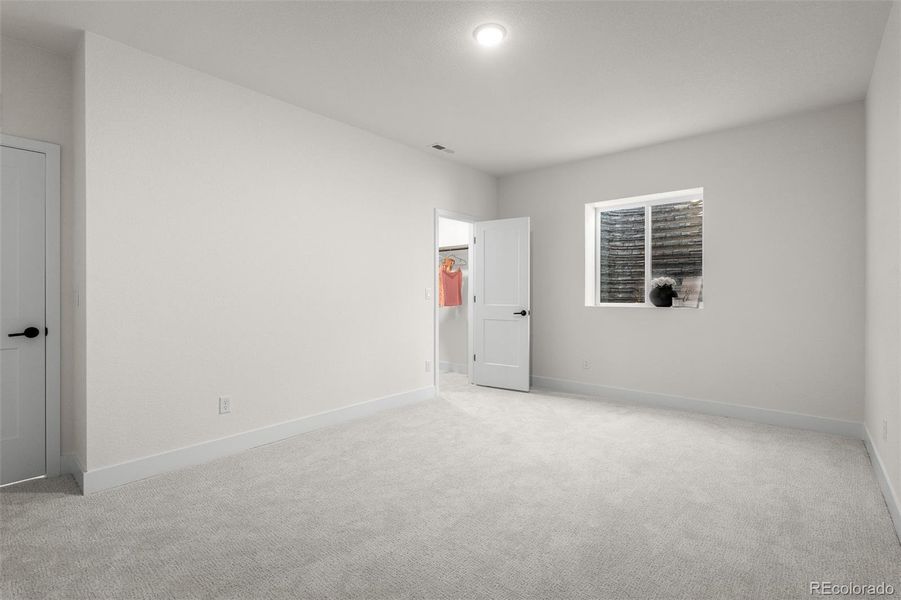 Spacious, unfurnished interior of a new home in Wolf Ranch - Enclave Collection, Colorado Springs (Image 20).