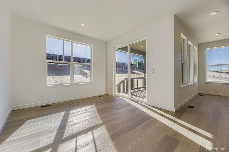 Spacious, unfurnished interior of a new home in Newlin Crossing: The Monarch Collection, Parker (Image 12). Spacious, unfurnished interior of a new home in Newlin Crossing: The Monarch Collection, Parker (Image 12).