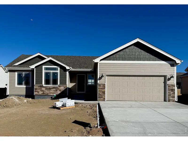 Front exterior of a new home in , Wellington, CO, highlighting curb appeal (Image 1). Front exterior of a new home in , Wellington, CO, highlighting curb appeal (Image 1).