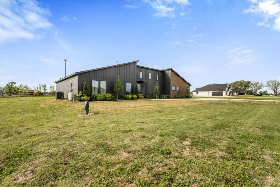 Exterior details and patio area of a home in , Sealy (Image 26).