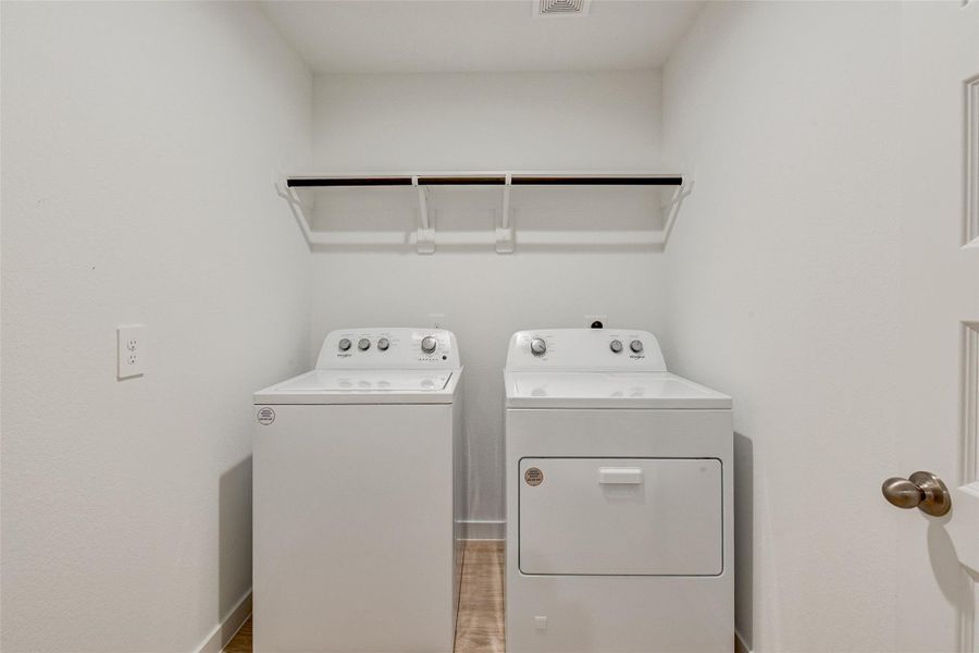 Furnished interior view inside a new home in Post Oak Pointe, Fresno (Image 5).