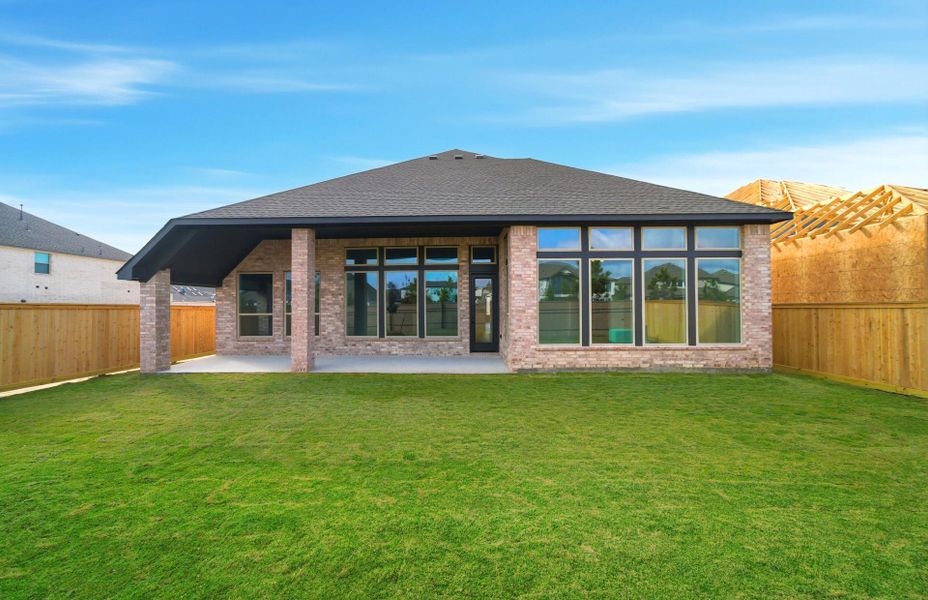 Exterior details and patio area of a home in Bridgeland 60′, Cypress (Image 3).