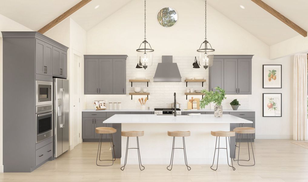 Kitchen with pendant lights and vaulted ceiling