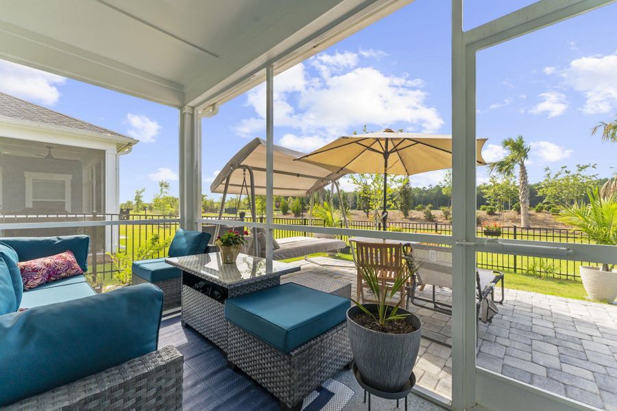 Exterior details and patio area of a home in Horizons at Carnes Crossroads | 55+, Summerville (Image 19).