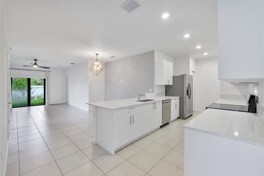 Furnished interior view inside a new home in , Dania Beach (Image 13). Furnished interior view inside a new home in , Dania Beach (Image 13).