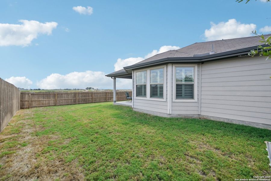 Exterior details and patio area of a home in Meyers Landing, New Braunfels (Image 20).