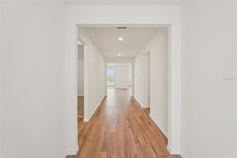Spacious, unfurnished interior of a new home in Oakfield Trails - Signature Series, Parrish (Image 16).