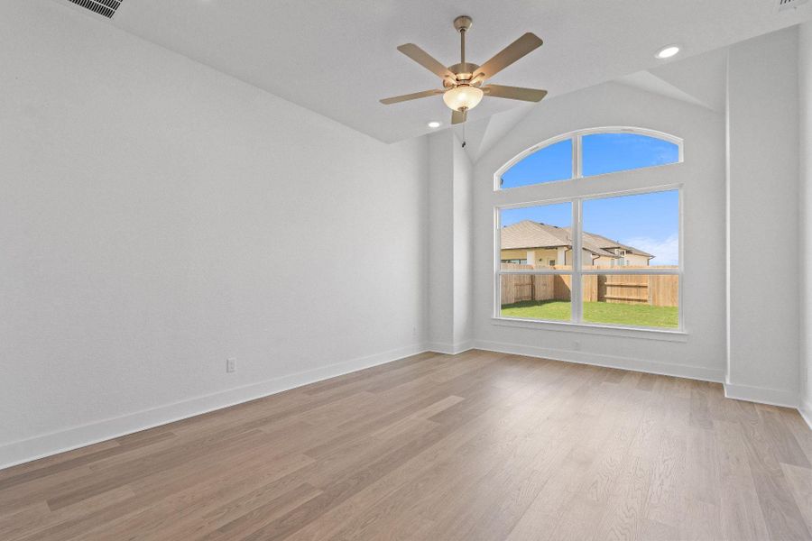 Primary Bedroom with elevated ceiling