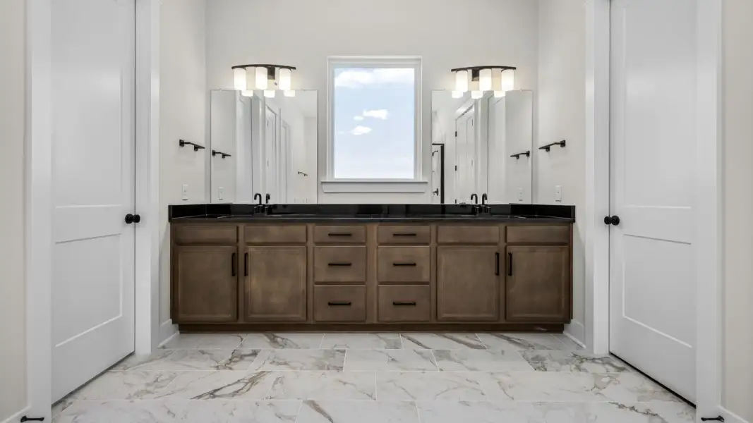 Dual vanity in primary bathroom