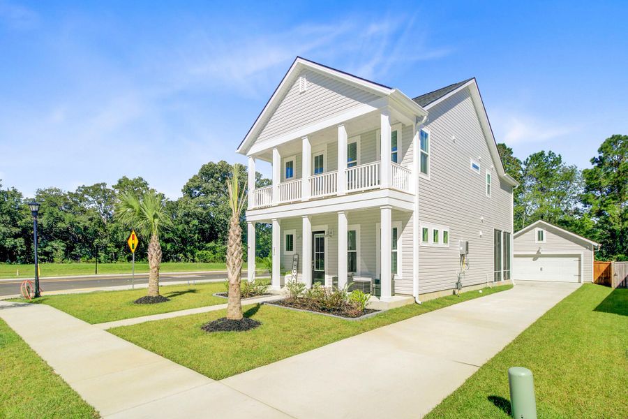 Front exterior of a new home in Limehouse Village: Row Collection, Summerville, SC, highlighting curb appeal (Image 28).