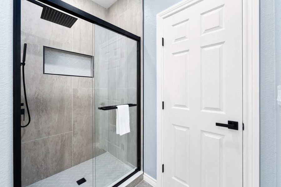 Full bath with a shower stall Full bath with a shower stall