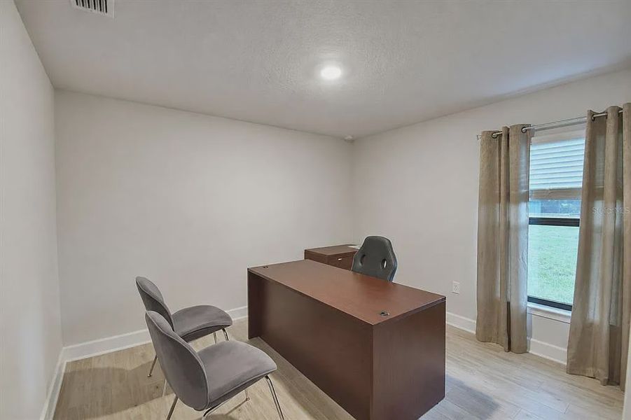 Furnished interior view inside a new home in Lake Juliana Estates, Auburndale (Image 31).