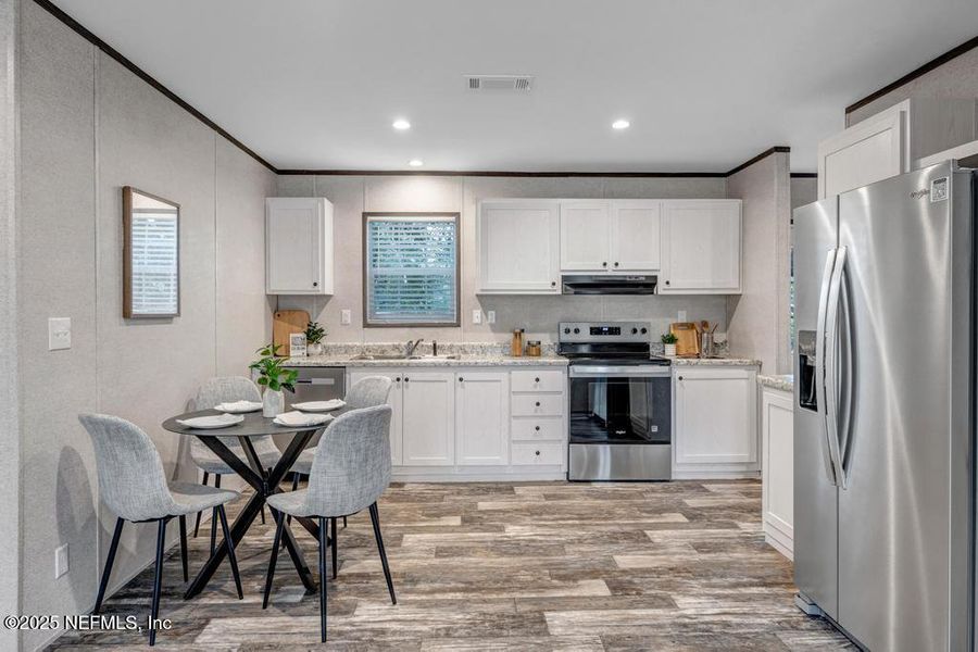 Furnished interior view inside a new home in , Jacksonville (Image 3). Furnished interior view inside a new home in , Jacksonville (Image 3).