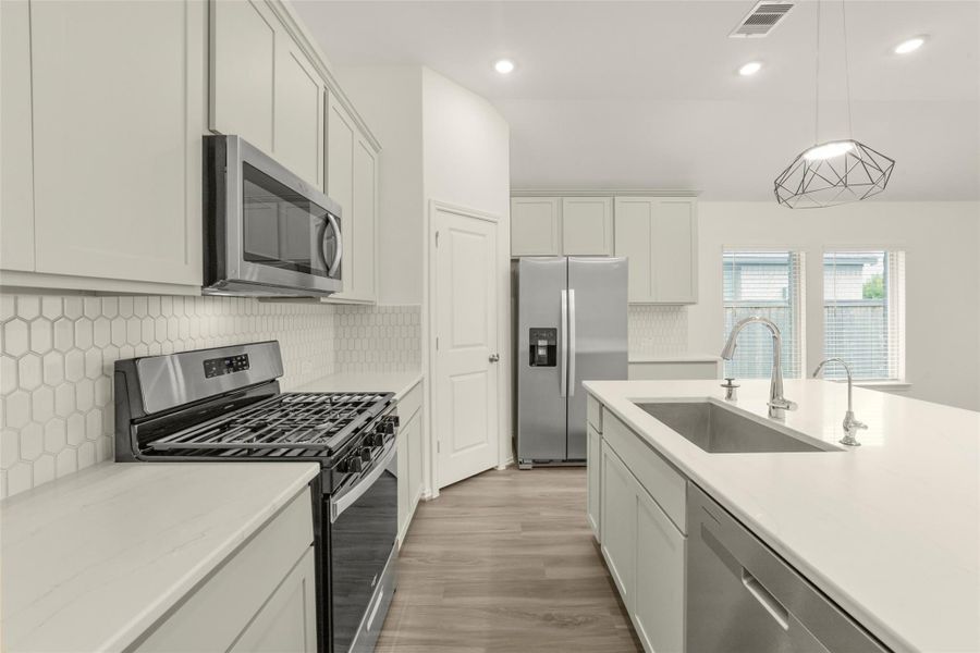 Furnished interior view inside a new home in Bridgeland, Cypress (Image 8).