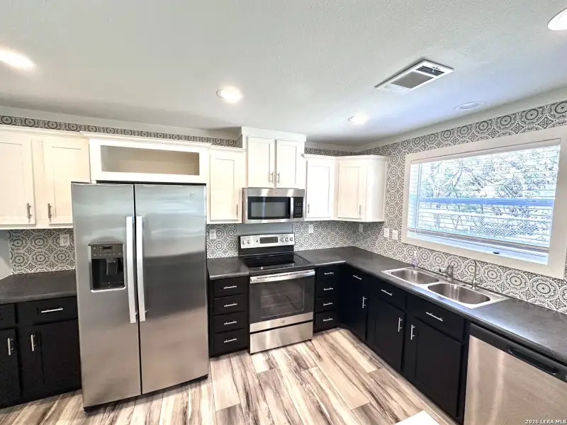 Furnished interior view inside a new home in , Lakehills (Image 3).