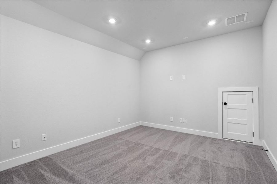 Grab the popcorn, put on a movie, and enjoy a wonderful evening in your amazing Media Room! Featuring plush carpet, custom paint, and custom lighting making this the perfect room for relaxing!